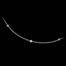 Pretty platinum diamond necklace.  The piece is set with 5 diamonds weighing .52ct total.  VS G-H quality.