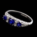 Charles Green's regal Victorian 18kt white gold engagement ring shines with .68ctw of sapphires and .07ctw of diamonds. Also available in yellow gold and platinum. 5mm to 7mm width. Available in Ruby and Emeralds. Handmade in England.