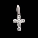 Simple and elegant. Charles Green's 18kt white gold cross pendant. Set in this cross are .68ctw in fine diamonds.   Forged and perfect!