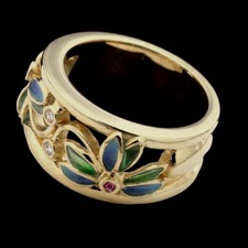 An exquisite 18kt yellow gold ring from Nouveau Collection with rubies and diamonds.  The flower petals are of blue and green enameling.