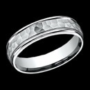 A unique looking 14k white gold mens wedding band from Benchmark. This Benchmark ring is 6mm, but can be made in other sizes. It features a high polish edge with a hammered finish center. The price is for a size 10, but can be made in other sizes. Prices may vary depending on finger size.

