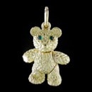 A very cute Robert Bielka 18kt. gold baby bear with ruby eyes. The arms, legs and head all move. Very solid piece measuring 7/8''. Available in a large size 1 1/8'' for $3,450.00. Made in the USA and solid!