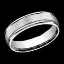 A stylish and masculine 14k white gold mens wedding band. This ring features a high polish round edges that has a wired finish center. The width of this ring is 6mm, but can be made in other sizes. The ring can also be made in yellow gold, rose gold, and platinum. The price is for a size 10, but can be made in other sizes. Prices may vary depending on finger size.