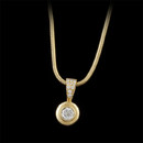 Chris Correia bezel set diamond pendant with diamond pave' bail.  The center stone weighs .58ct. with .13ct. in diamonds on the bail.  The piece is suspended on a snake chain measuring 20 inch in length.
