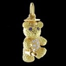 This cute, 18k gold, teddy bear is called "The Graduate". He has a mortar board hat with a diploma in hand. His tummy has pave set diamonds with a total carat weight of 0.19tcw. The eyes are blue sapphires. Measures approximately 28mm tall by 18mm wide.