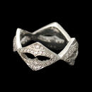 Beautiful platinum and diamond "Beluga" wedding ring by Cathy Carmendy.  This stunning ring is set with .60ct of VVS F diamonds. The ring is 10mm in width. Size 6 1/2.  This is a solid heavy ring weighing 10 grams.  The ring is 9.5mm in width at the widest part.   Made in the USA