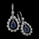 French lever-back Carl Blackburn earrings: .72 carats of blue sapphires sway elegantly in a frilled cradle of 18k white gold set with .43 carats of diamonds.