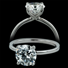 Sholdt  Four prong solitaire ring