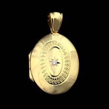 Charles Green Charles Green 18kt engraved locket with diamond