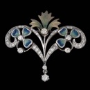 A beautiful 18kt white gold brooch designed by Nouveau Collection, with diamonds and gorgeous enamel work. This piece can also be worn as a pendant.