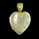 A gorgeous 18kt gold heart locket from English jeweler Charles Green. The locket features .28ct of fine diamonds. Hand forged and measures 23mm x 21mm.