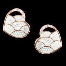 These stud earrings feature white sapphires, set in sterling silver, plated with rhodium for easy care. The center reflects and moves with the light giving it a 3D effect.