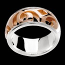 A unique sterling silver ring, partly rose gold plated, rhodium plated. A great ring that makes a slight statement the ring is polished.