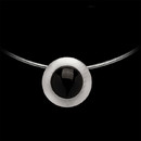 This beautiful Onyx pendant by Bastian is sterling silver with a brushed bezel around the center onyx. This pendant measures 21mm in diameter.  The piece is suspended on an omega neck wire which measures 16.50 inches in length with a lobster claw clasp. 