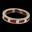 A beautiful channel set princess cut ruby and diamond wedding ring from Spark. Set in 18k gold with .65ct diamonds and 1.71ct in rubies. This ring is also available in white gold or platinum.