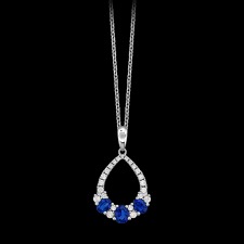 Simple elegance describes this 18 karat white gold pendant by Spark Creations. The pendant features 0.81 carats of fine blue sapphires and 0.28 carats of round brilliant cut diamonds. This pendant is suspended from a luxurious and sturdy 18 karat white gold cable link chain. 