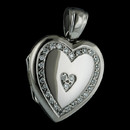 The heart shaped locket is such a classic statement. This very pretty locket is from the Charles Green collection. Crafted in 18k white gold the locket is set with .29ctw of pave diamonds set into the perimeter of the heart.  23 x 21mm, hand forged

