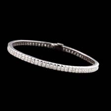 This is our straight line bracelet shown in white gold with princess cut diamonds. These bracelets begin at 4.25cts total prices start at...