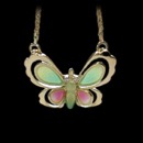 18kt gold enameled butterfly necklace from Spain. The piece is suspended on a 17 inch 18kt chain. The butterfly measures 13mm x 19mm.