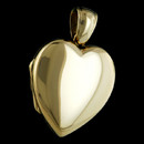 Classic and beautiful 18k yellow gold heart locket by English jeweler Charles Green.  The heart measures 23x21mm and makes the perfect keepsake.  