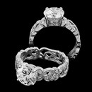 Floral engagement ring from Carl Blackburn, encrusted with .46ctw of brilliant diamonds and set in 18k white gold. Width 5.4mm and can accommodate a 1.0ct to 4.0ct diamond. Center stone, not included.