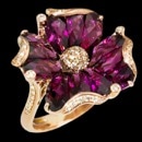 A very pretty 14k rose gold Mademoiselle ring from jewelry designer Bellarri. This ring is set with round diamonds weighing 0.26 carat total weight. In the center of the flower design are rhodolites weighing 9.55 carats total weight. Top of ring is approximately 18mm x 18mm. The Mademoiselle collection from Bellarri is one of a kind and a true work of art. The matching pair of earrings to this ring is 27BI2