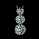 This is a lovely 18K diamond drop pendant from Beverley K.  There are 3 bezel set diamonds each surrounded by a round pave diamond halo and there is total diamond weight of .42 ct. 