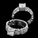Carl Blackburn's flowing vines engagement ring encrusted with .31 carats of diamond in handcrafted 18k white gold and is 6mm width. Please call for center stone pricing.This ring is available in platinum at a price of $2,980.