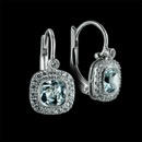 This is a beautiful pair of 18K white gold Aquamarine earrings from Beverley K.  The bezel set center Aquamarine is surrounded by a pave diamond cushion shaped border.  The total weight of the Aquamarines is 1.12ct and there is .15ctw of diamonds.  