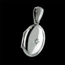 Simple and elegant this classic Charles Green 18 kt. white gold oval shaped locket with a single accent diamond. The oval measures 13 X 16mm and makes a beautiful treasured pendant. Hand forged!