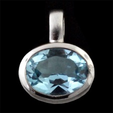 A sterling silver blue topaz pendant from German designer Bastian Inverun. The Pendant measures 10mm x 15mm. There are several styles of chains to choose from ranging in price from $93.00 on up. 
