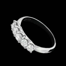 A captivating platinum wedding band design by Scott Kay. A clean high polish band accented with five full cut round brilliant diamonds 0.75ctw. A timeless symbol of love.