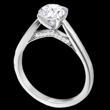From the Signature Collection of English jewelry designer Charles Green. This 18k white gold solitaire engagement ring is micro-set with 18 x 0.005ct G/Vs round brilliants on each side of the under bezel. The width of the ring is 2mm. This ring can be made in platinum. Call or email for prices on platinum.