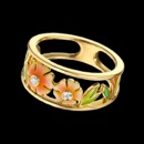 One of the most fashionable rings I have ever seen. This ring is from the Nouveau Collection and is made of 18k gold with a unique open shank design. The flowers and leafs are enamel and the ring has 3 diamonds with a total carat weight of 0.07tcw and weighs 4.90 grams.