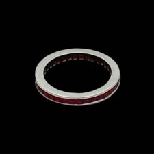 This sleek platinum band shimmers with 1.60cts. in channel-set rubies.