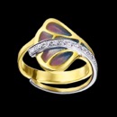 A gorgeous unique art nouveau inspired ring. This ring is made from 18k gold and features an enamel design. There are 10 diamond total on this ring, with a total carat weight of 0.14tcw. The measurements for the ring are 21mm x 20mm and weighs 6.8 grams.