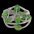 A art nouveau inspired sterling silver leaf ring. The leafs are enamel and add a great color contrast to the silver. The heights of the ring measures 21.30mm at it's tallest. Weighs 10.2 grams.