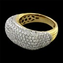 A truly beautiful 18k yellow gold diamond cluster Spark Collection ring. The band of the ring features a ridged texture that continues all the way around the ring.  The ring is set with 2.34ct of VS+ F ideal cut diamonds. 8mm width