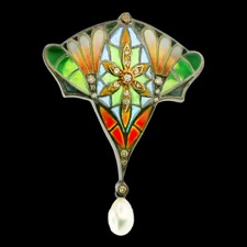 A true work of art. This Nouveau Collection pendant can also double as a brooch. Features beautiful enamel colors and made form 18k gold and silver. There are 13 diamond on this piece, with a total carat weight of 0.16tcw. The piece weighs 0.66 grams