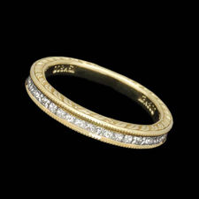 18kt yellow gold diamond channel set wedding band by Scott Kay.  The ring is 3mm in width and set with .36ctw of princess cut diamonds.  The finish is a carved antique and milgrain finish.
