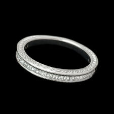 A platinum Scott Kay diamond wedding band set with .36ct of princess cut diamonds.  The ring is 3.2mm in width and has a carved antique and milgrain finish. Also comes in 19kt yellow gold.