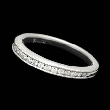 A fine platinum diamond wedding band set with .25ct of round diamonds, designed by Scott Kay.  The ring measures 2.9mm and is bright polished with milgrain around the channel.