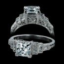 This Beverley K 18kt ladies engagement ring is made for a princess shaped stone. The Art Deco inspired setting has 0.29 carats total weight of princess diamonds and the scroll design is hand engraved. All edges have a beautifully detailed milgrain design.  Please call for center stone pricing. Also available in platinum.  