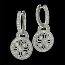 These beautiful diamond earrings are shown in 18kt white gold.  The charms are removable and the huggie earrings can be worn separately.  The total diamond weight for these earrings is .51ct.
The dangle disc is 11mm in diameter and a overall length of 23mm.