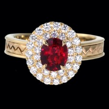 A one-of-a-kind ruby and diamond ring. Made in 18k with a beautiful hand woven band complete with one stunning pigeon blood ruby surrounded by a double halo of vs g-h color diamonds. Center stone sold separately, please call for pricing.  