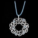 A fun looking sterling silver necklace, from German designer Bastian Inverun. This necklace features a stain cord measuring 31.5 inches in length and you can adjust the length to any size that you'd like. The pendant measures 56mm in height (including bail) by 50.5mm in width. 